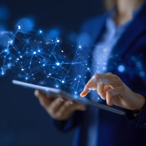 Image of assessment being completed on a tablet by a female AI Consultant